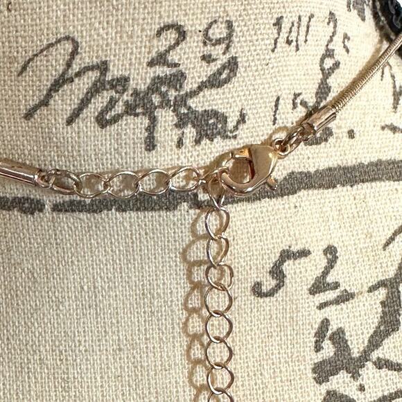 Gold Waterdrop Brushed Pendant on a Gold Rope Chain - Picture 13 of 13